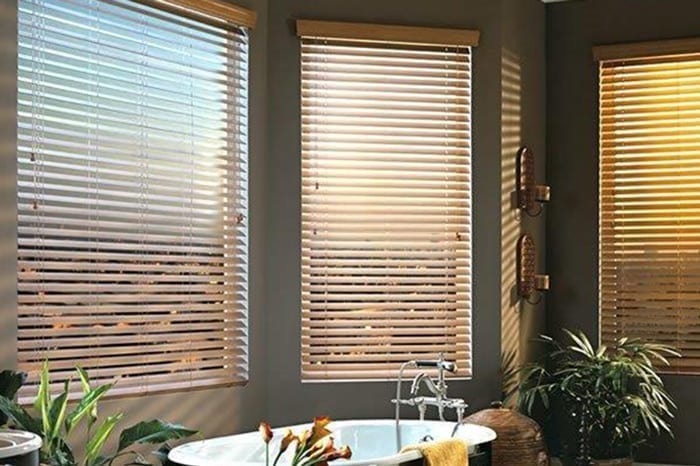 bathroom with white blinds